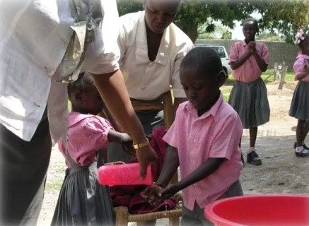 Washing hands.