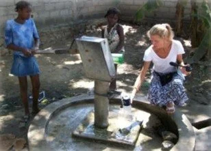 At the well.