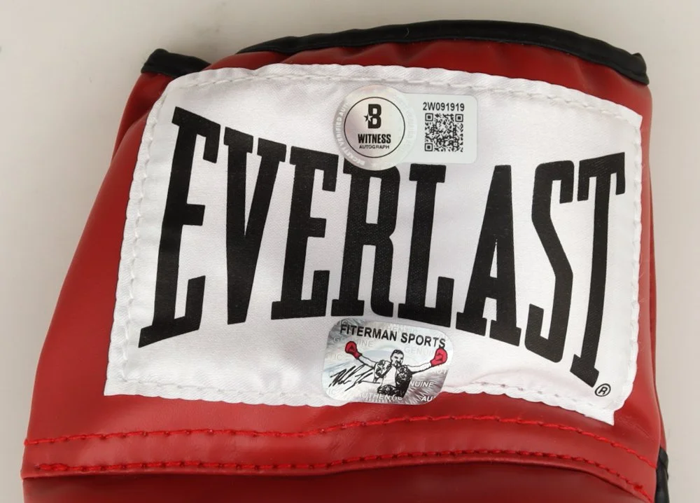 1728309748-Mike-Tyson-Signed-Everlast-Boxing-Glove-Beckett-Tyson-PristineAuction.com.jpg