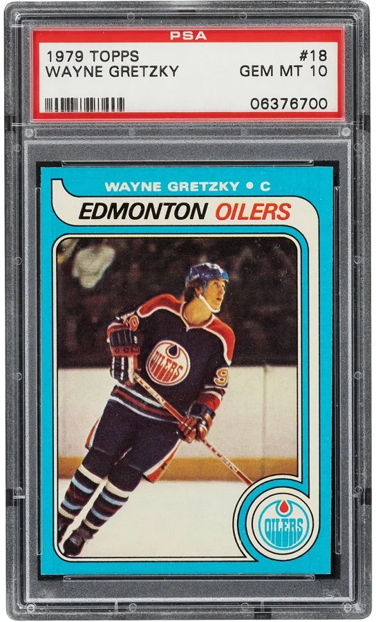 1979 Topps Wayne Gretzky Edmonton Oilers hockey card in graded PSA GEM MT 10, featuring Gretzky in hockey gear on ice.