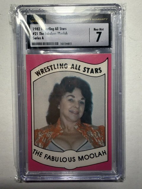 Graded wrestling trading card from 1982 featuring The Fabulous Moolah, labeled as near mint grade 7, encased in a protective plastic slab.