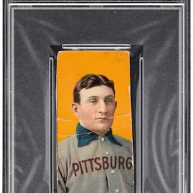 Colorized vintage portrait of a boy in a gray sweater and blue bow tie, with the word 'PITTSBURGH' on his sweater, framed by a silver border.