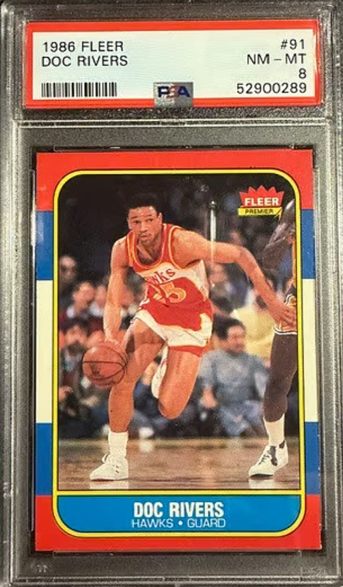 1986 FLEER Doc Rivers Rookie Card - PSA 8