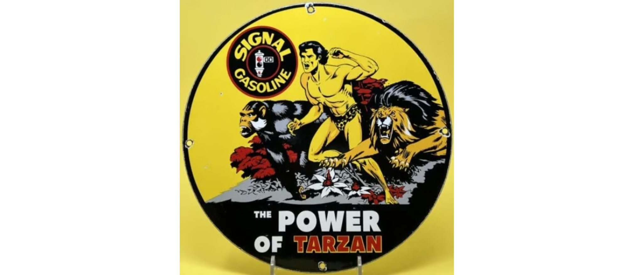 1957 Vintage Tarzan Signal Gas & Oil Porcelain Sign