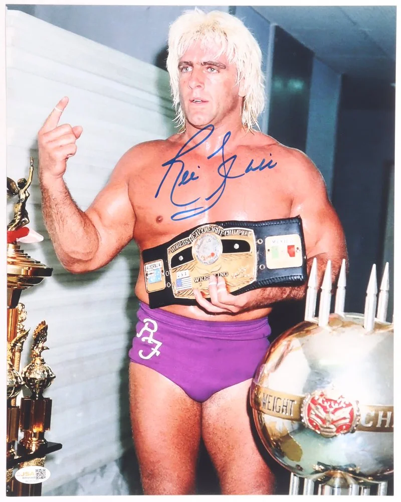Ric Flair Signed WWE 11x14 Photo (JSA)