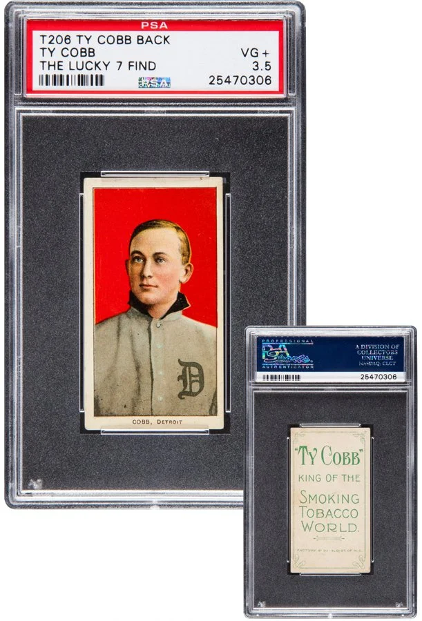 Two collectible cards graded and encased in protective plastic. The larger card features a portrait of Ty Cobb, a baseball player, with a red background and a gray uniform with a letter 'D' on the chest. The smaller card advertises Ty Cobb as the 'King of the Smoking Tobacco World.'