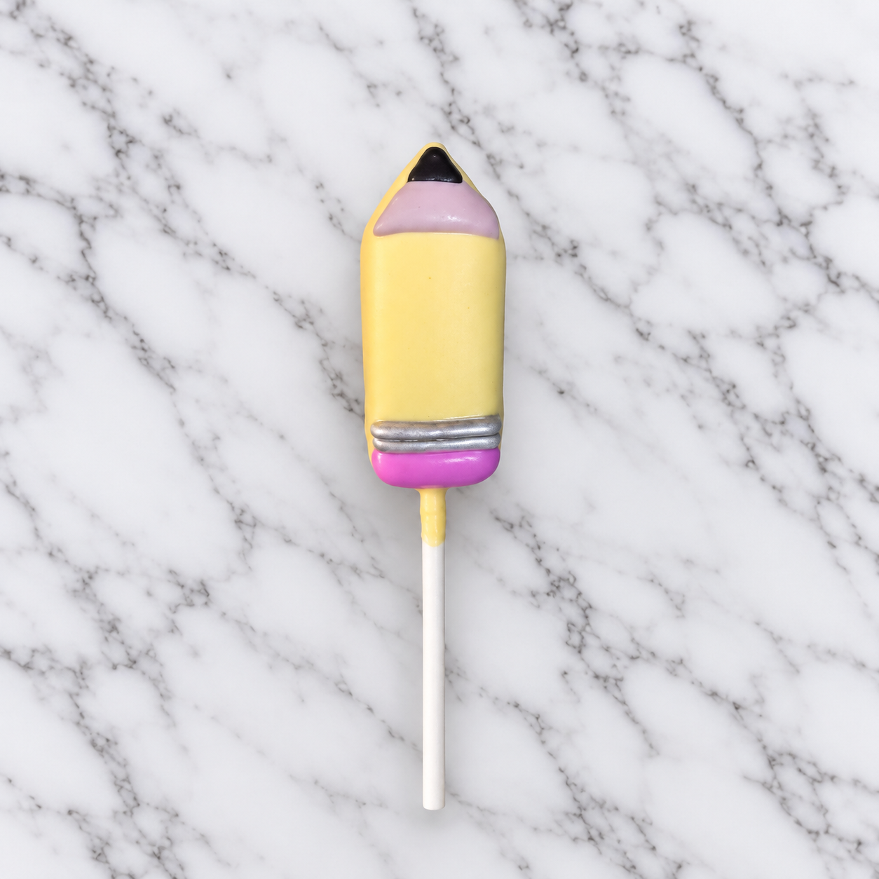 Pencil-Shaped Cake Pop on Marble.png