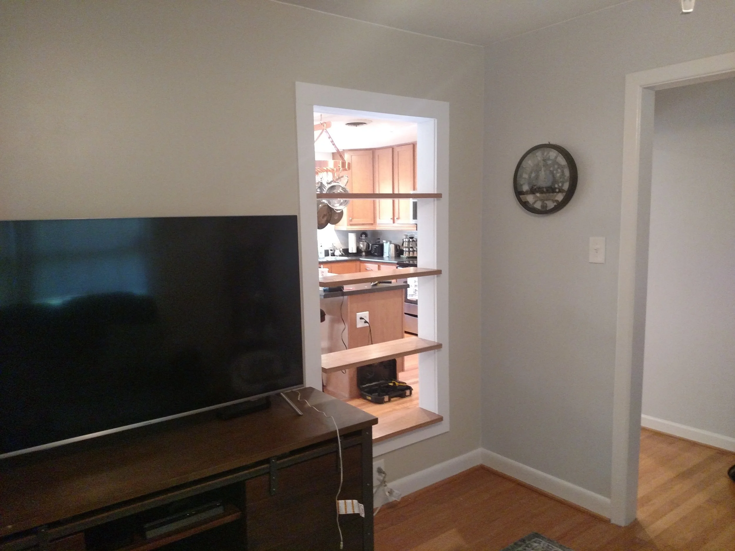 Custom structural wall pass through shelving units