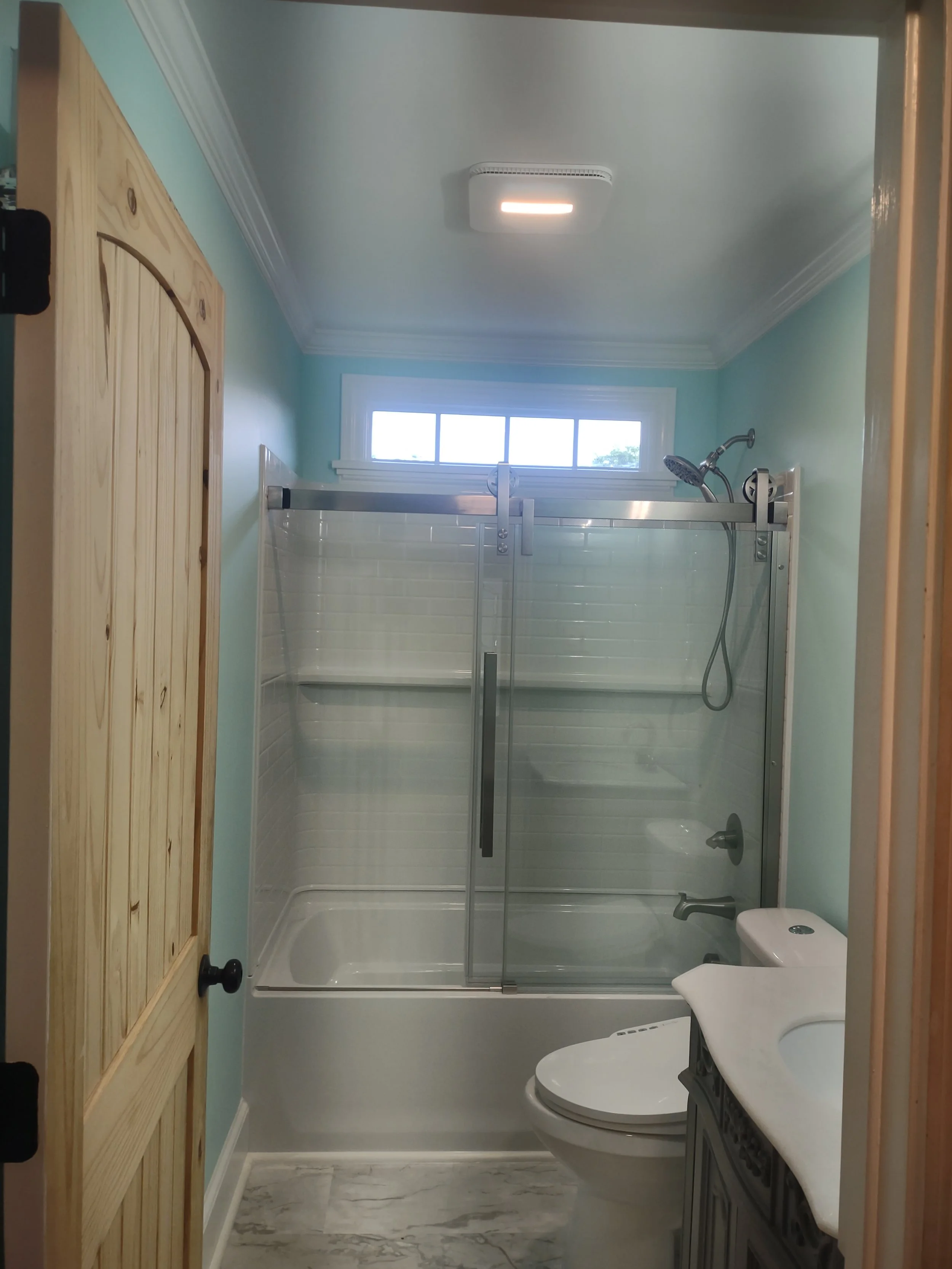 Compact full bath remodel with "true" waterproof floor
