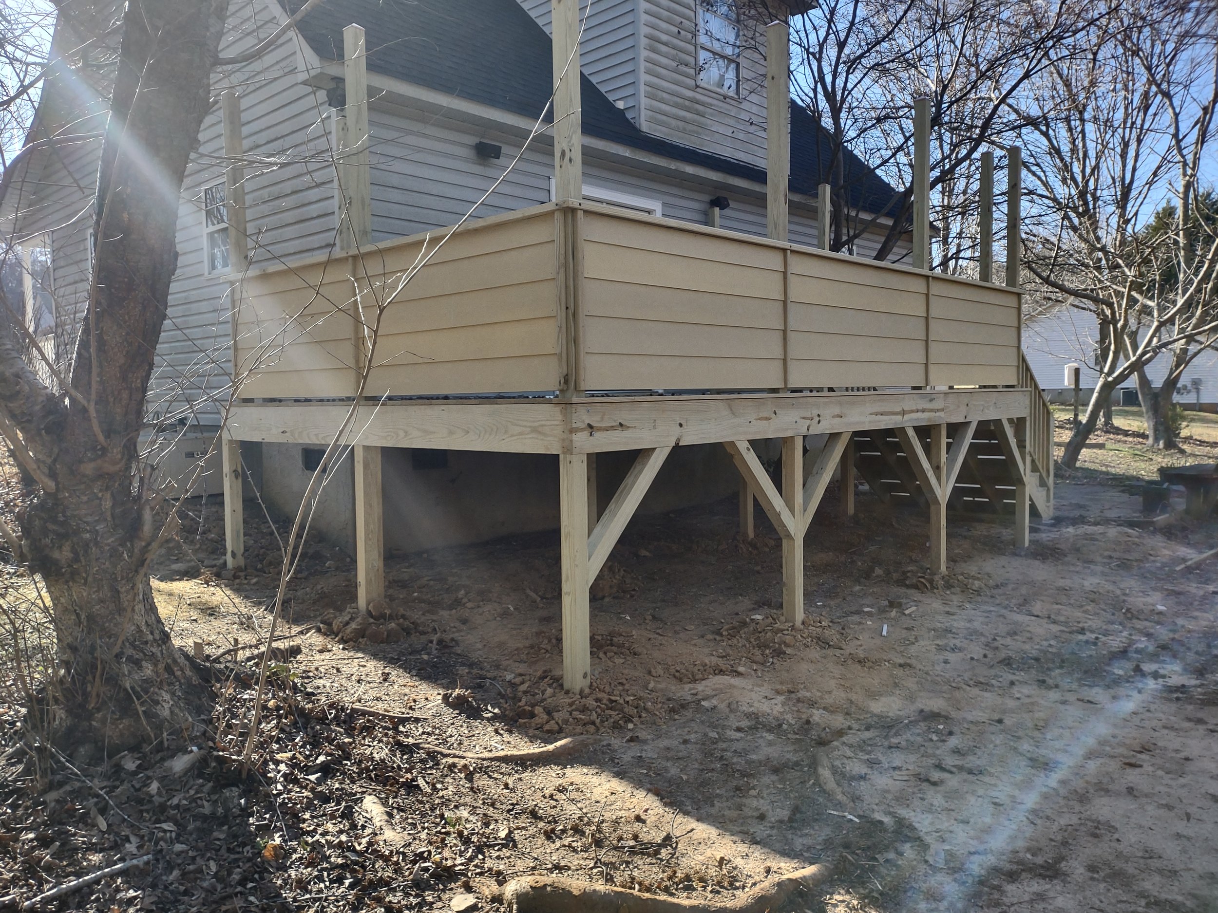 Custom deck built for privacy and with rope light posts built in by special request