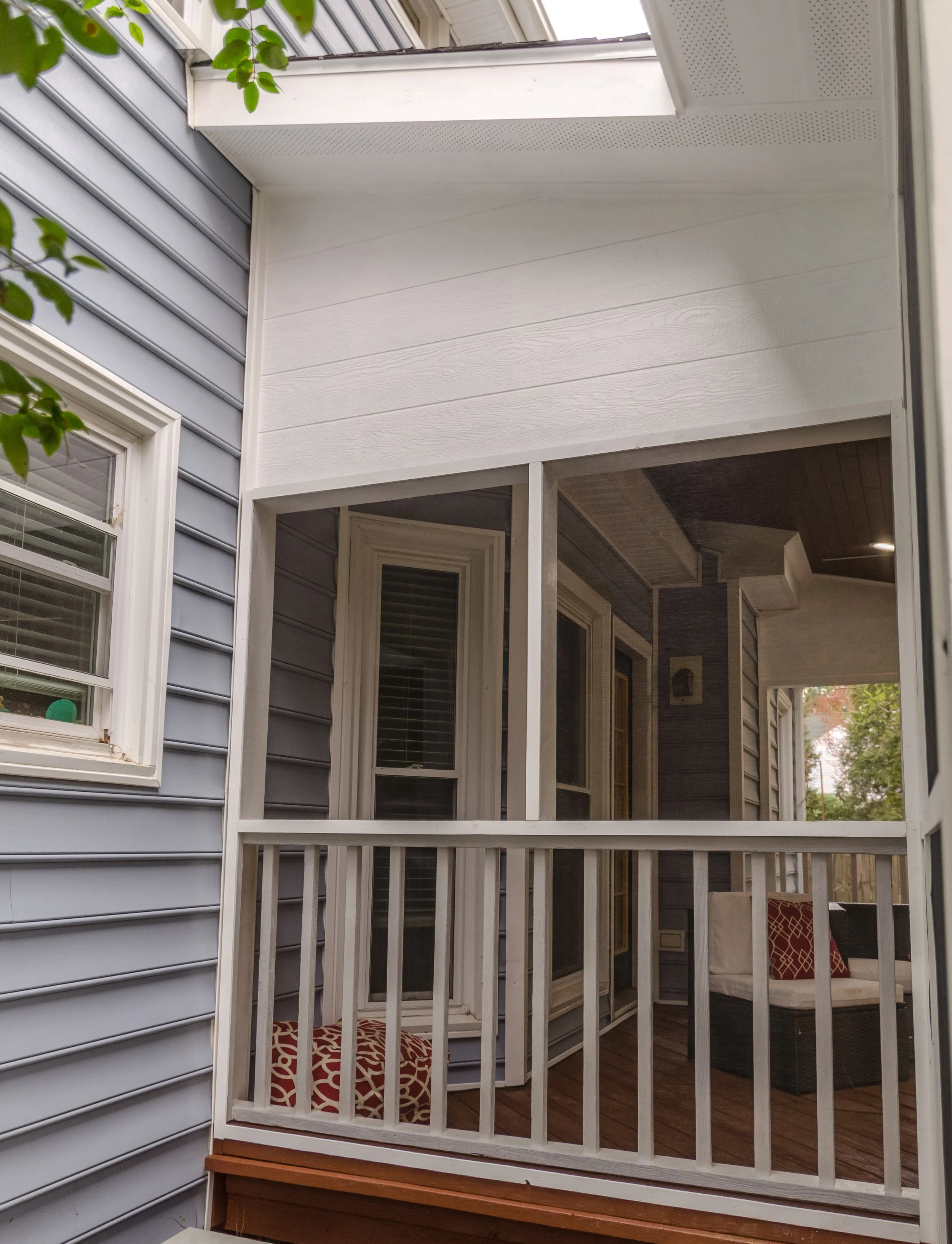 Existing deck converted to covered screened outdoor space