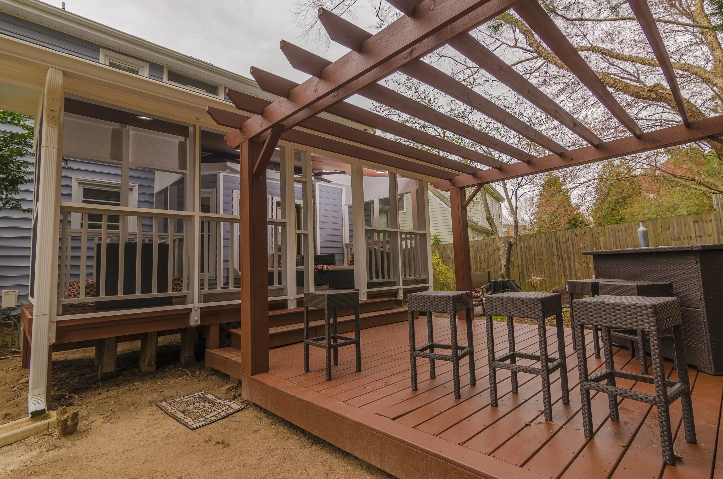 Existing deck converted to covered screened outdoor space
