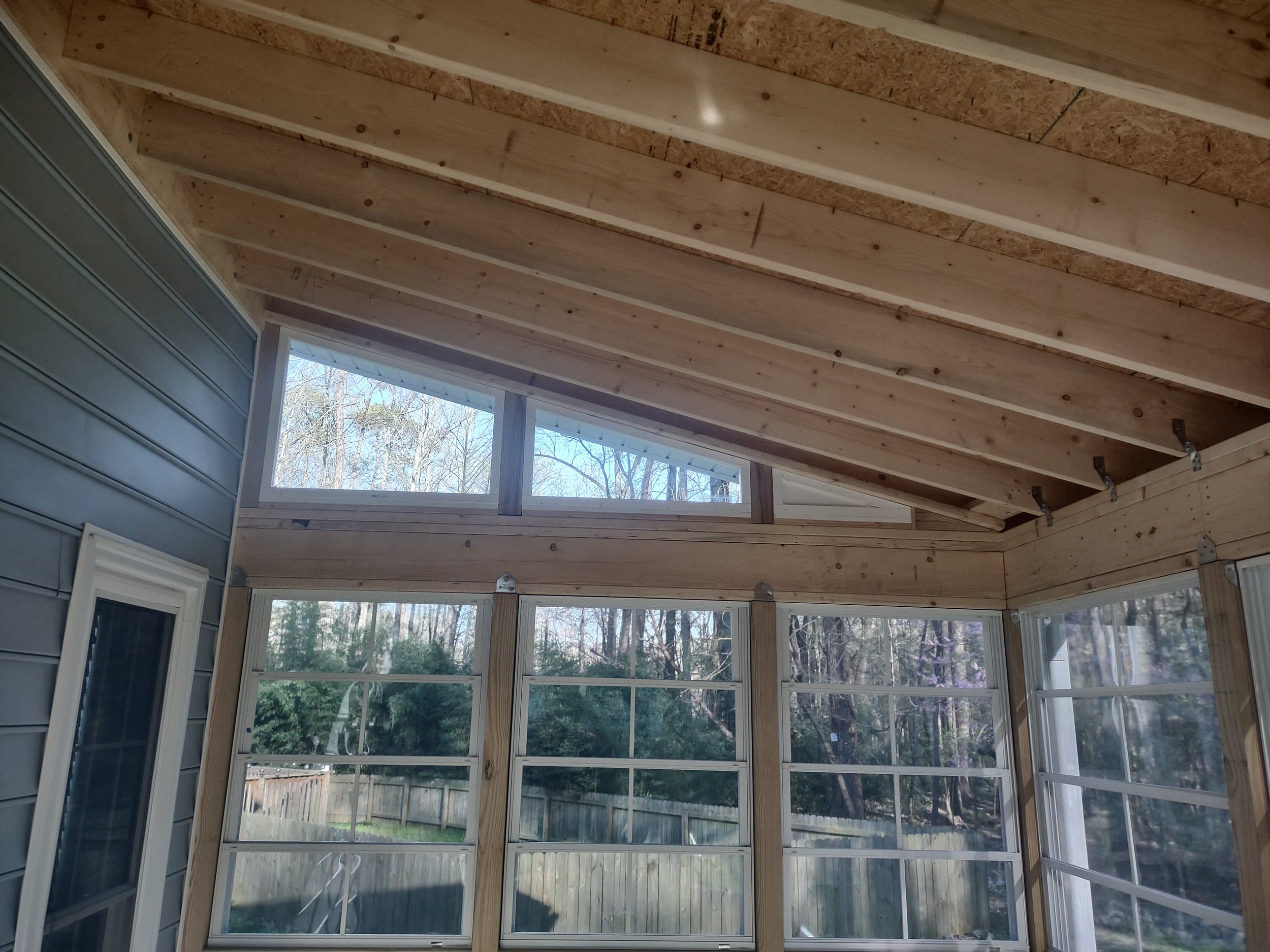 The exposed framing can be finished later but still looks good in the space due to the quality construction that went into the build