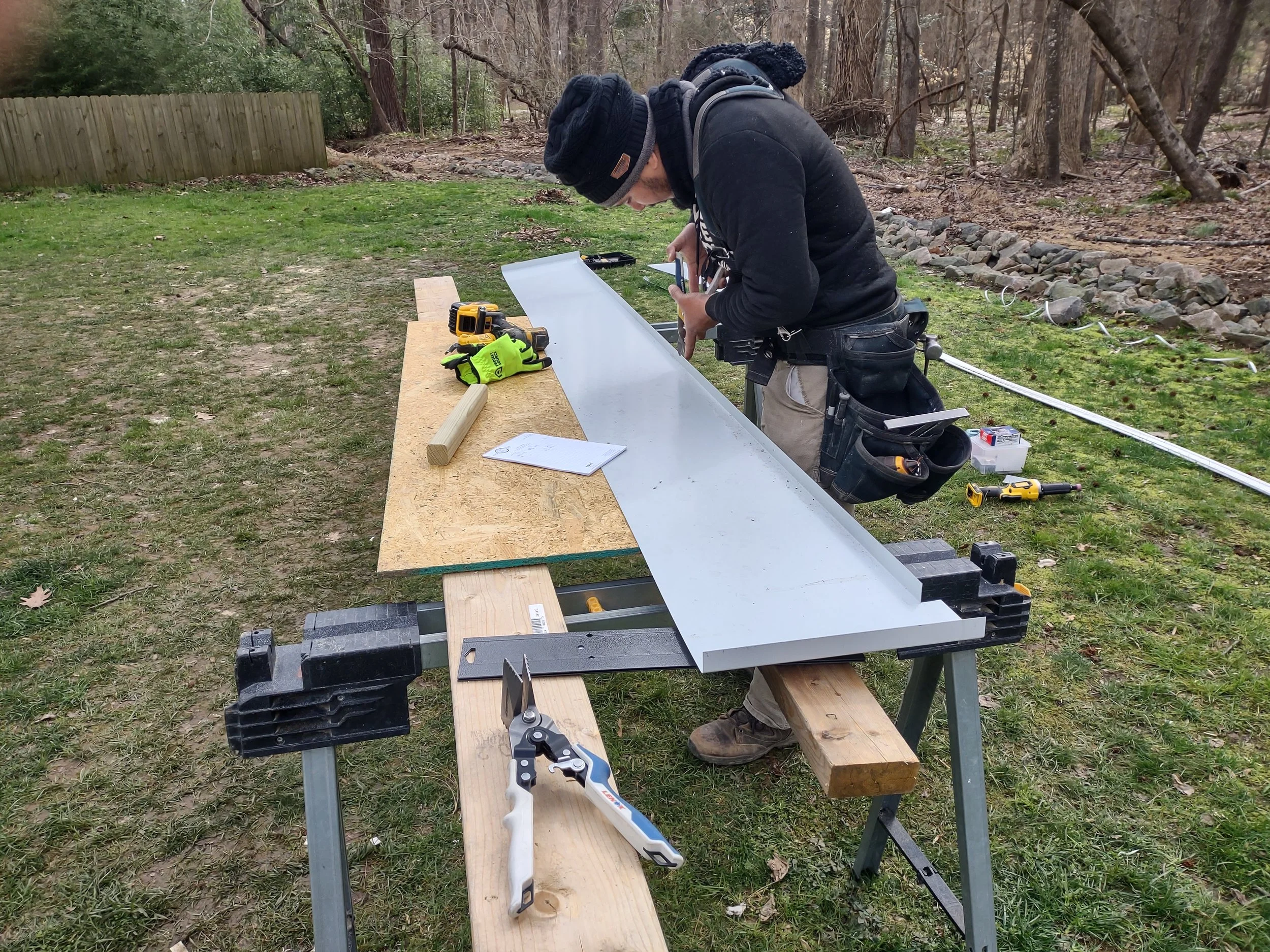 Steel cladding for the top beams being custom fabricated on site