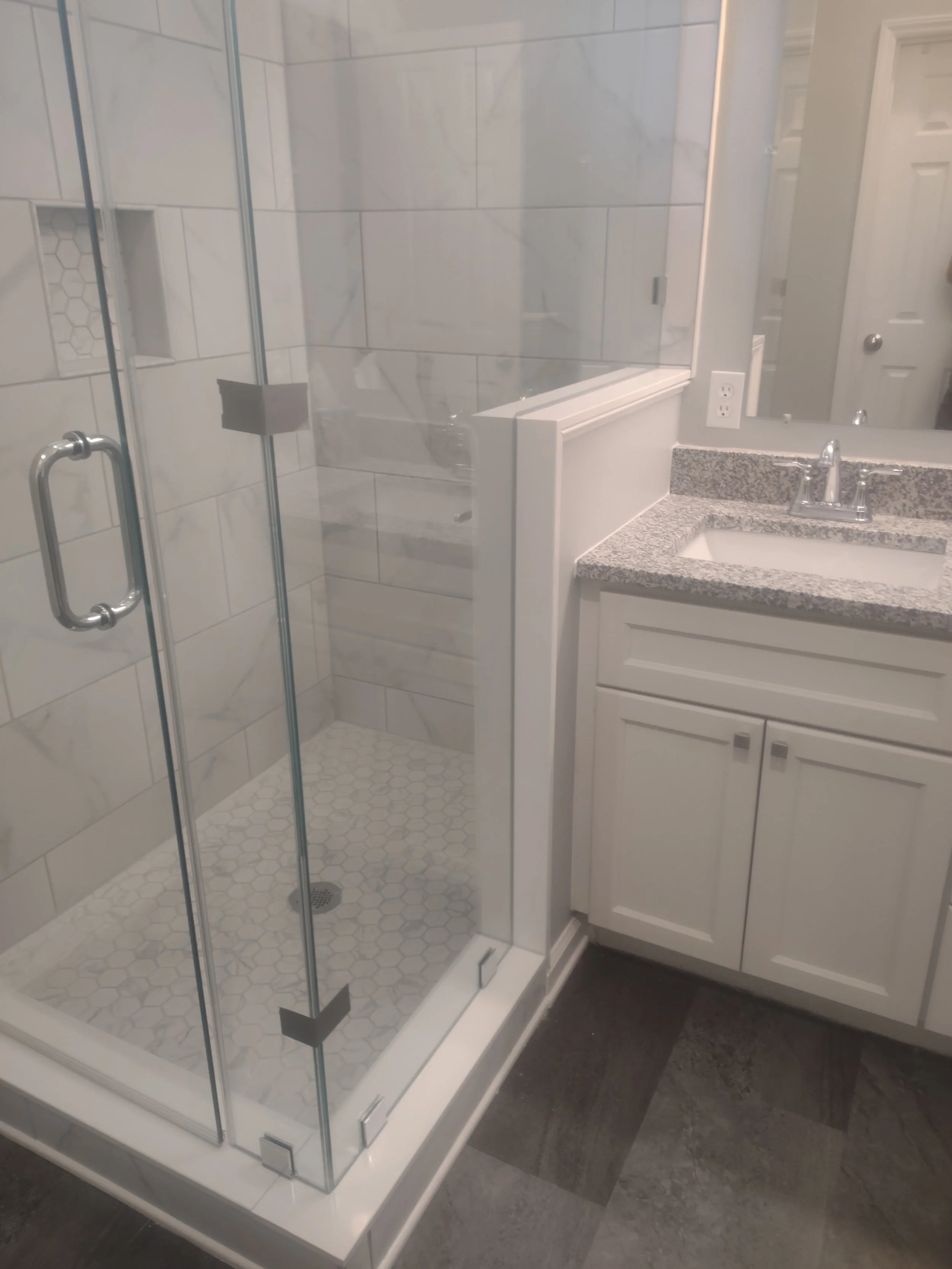 Master bath remodel emphasizing ergonomic flow and space efficiency