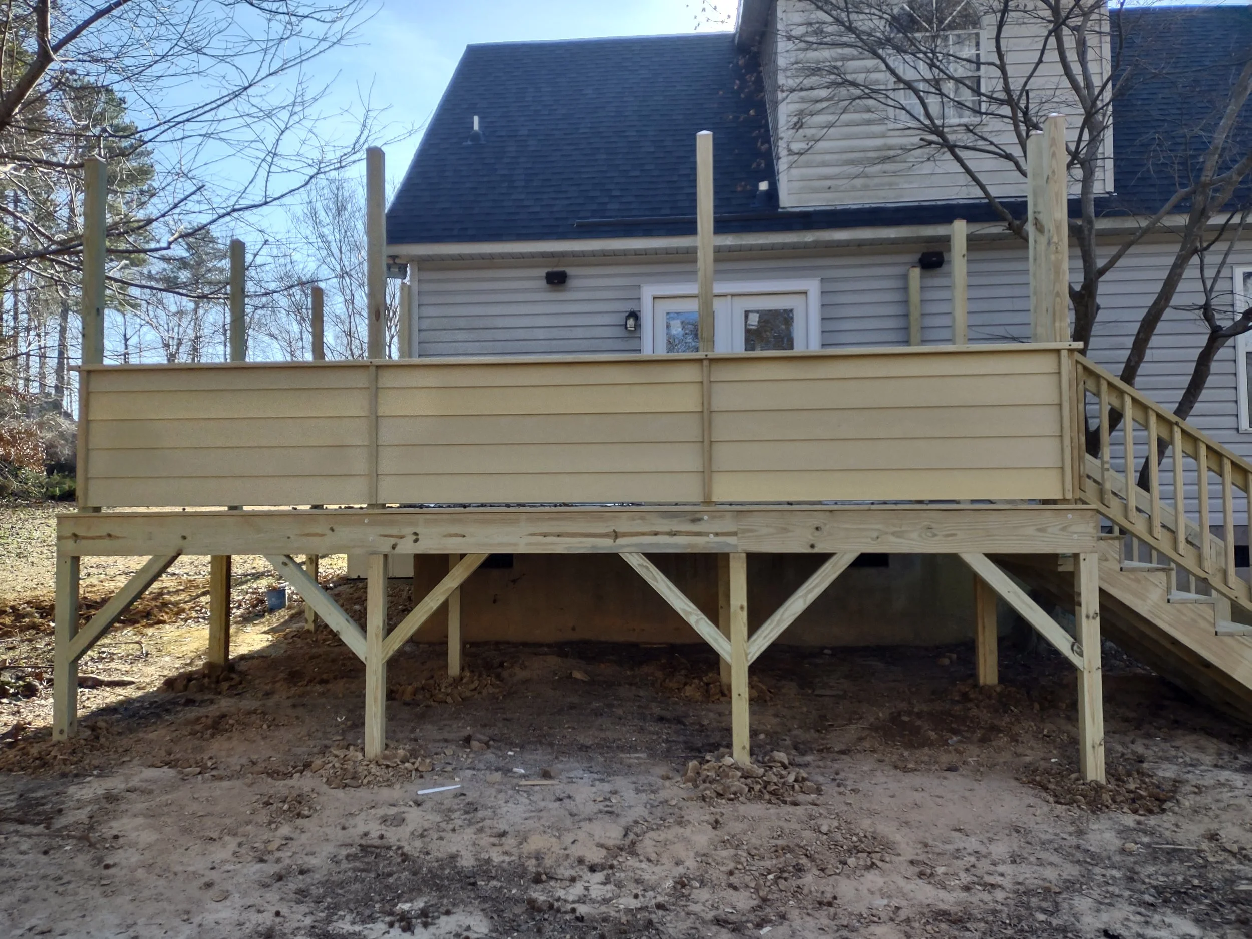 Custom deck built for privacy and with rope light posts built in by special request