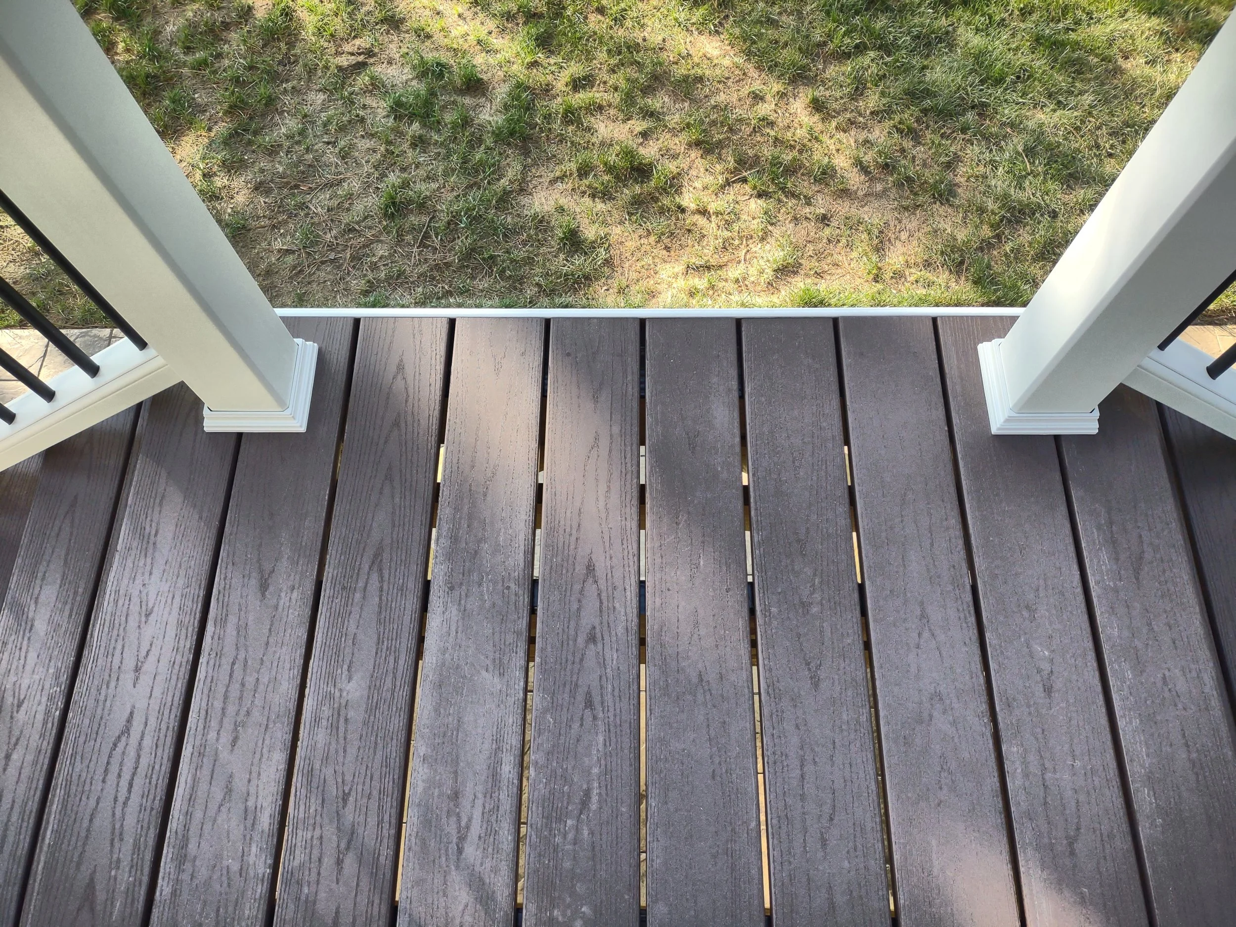 Premium dual staircase build with TimberTech treads and Trex railing. The decking and treads are fastened using TimberTech's hidden fastener system.