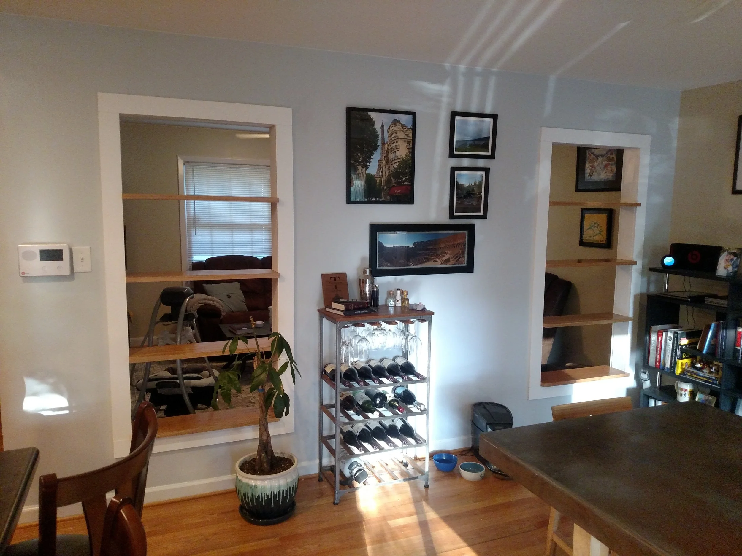 Custom structural wall pass through shelving units