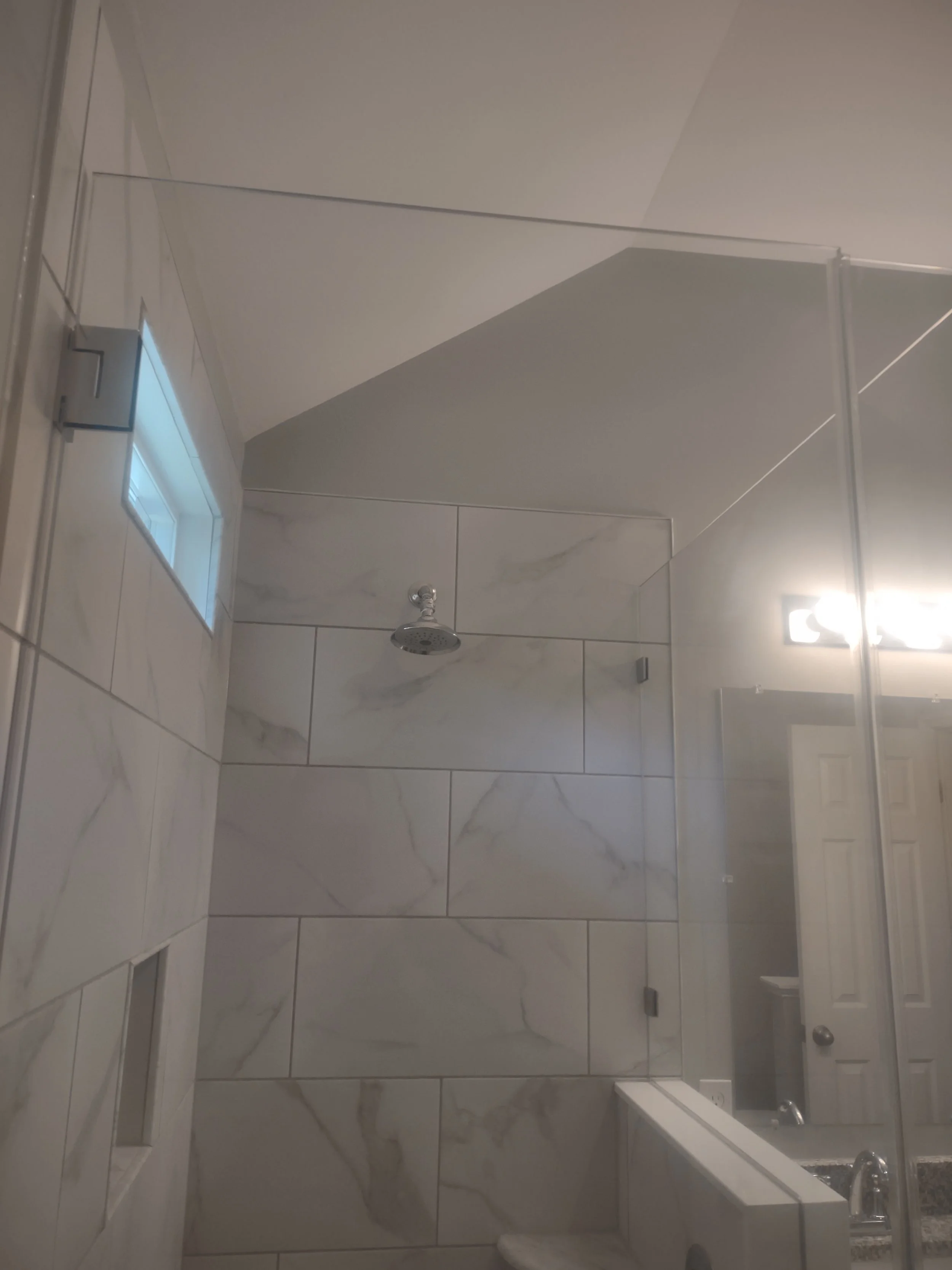 Master bath remodel emphasizing ergonomic flow and space efficiency