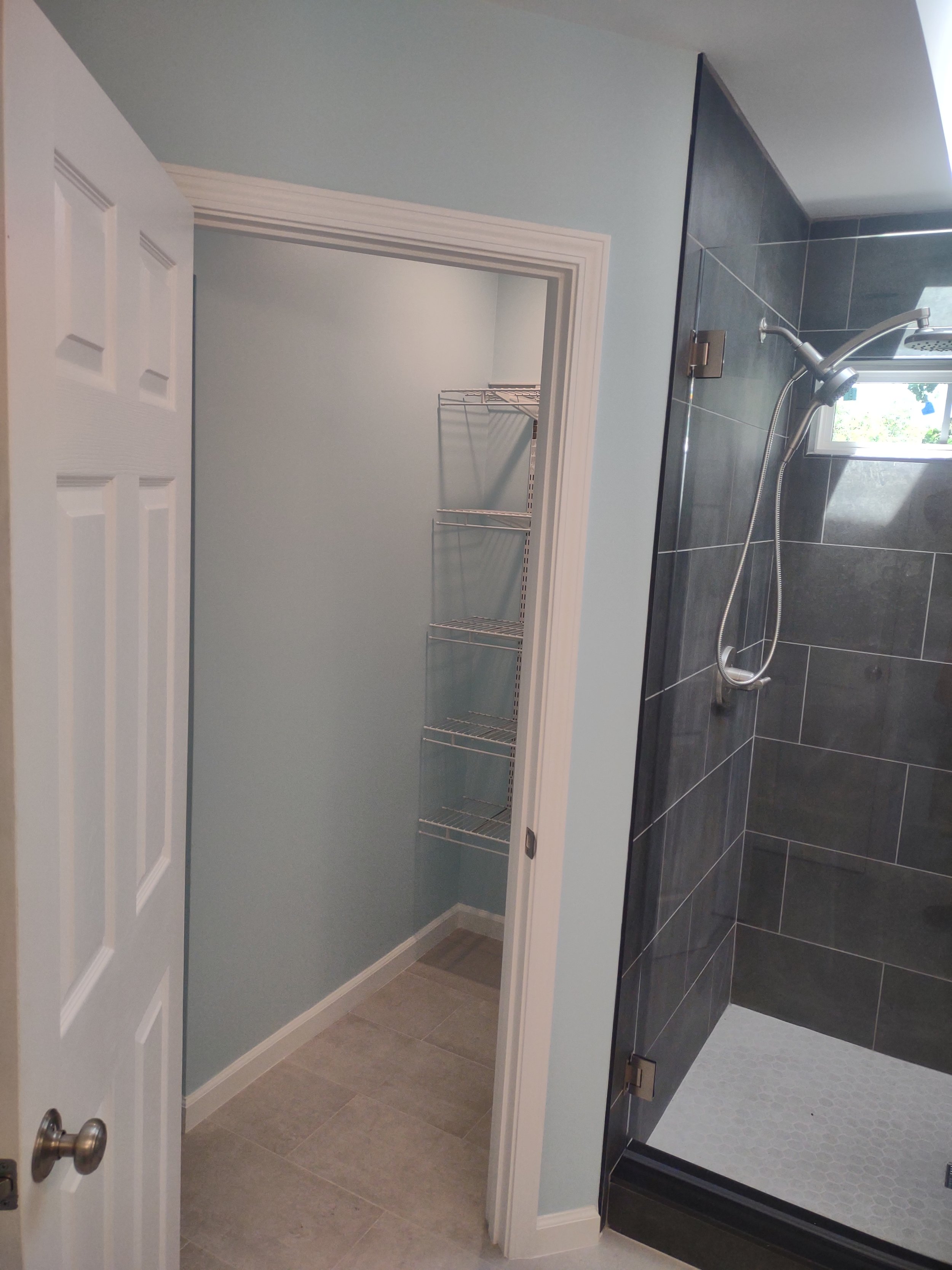 A master bath remodel emphasizing space efficiency and open feel