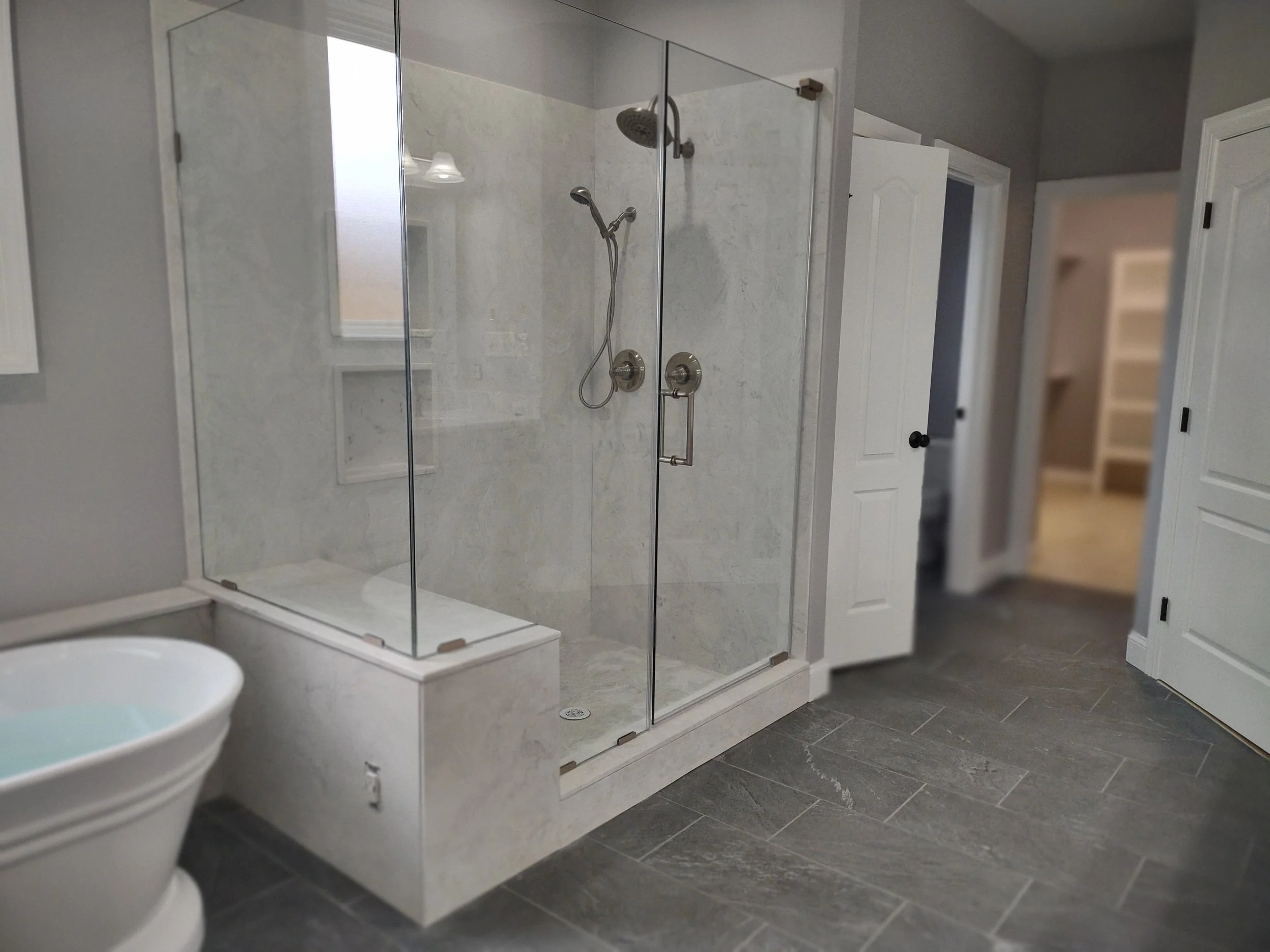 Complete Master Bath remodel with one piece custom made cultured marble panels