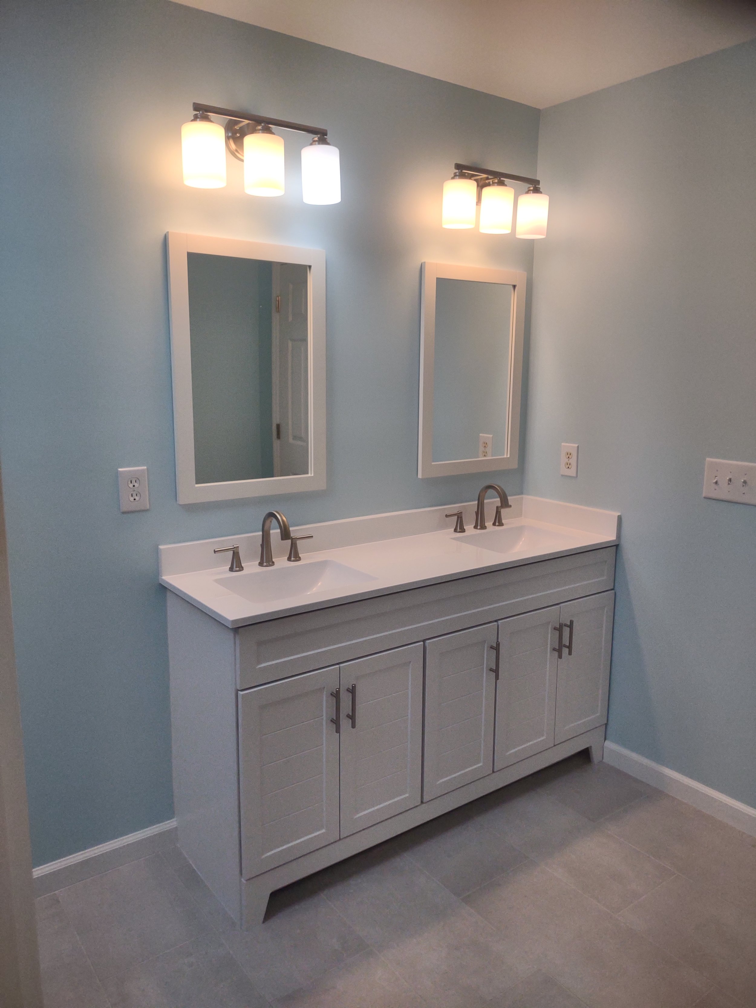 A master bath remodel emphasizing space efficiency and open feel
