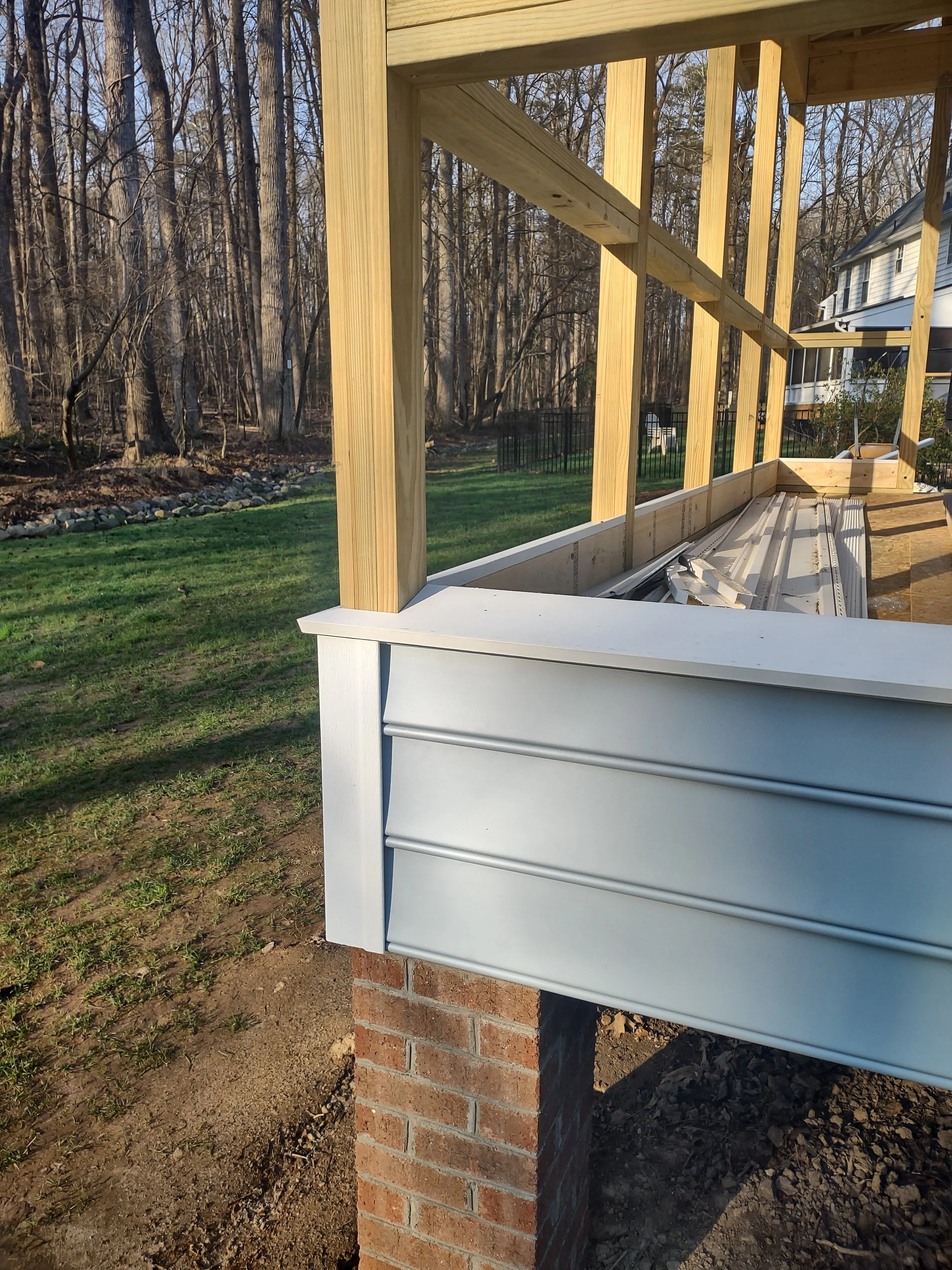 15 degree expanded vinyl sills are built into the framing awaiting window assembly. Any water and moisture will drain away