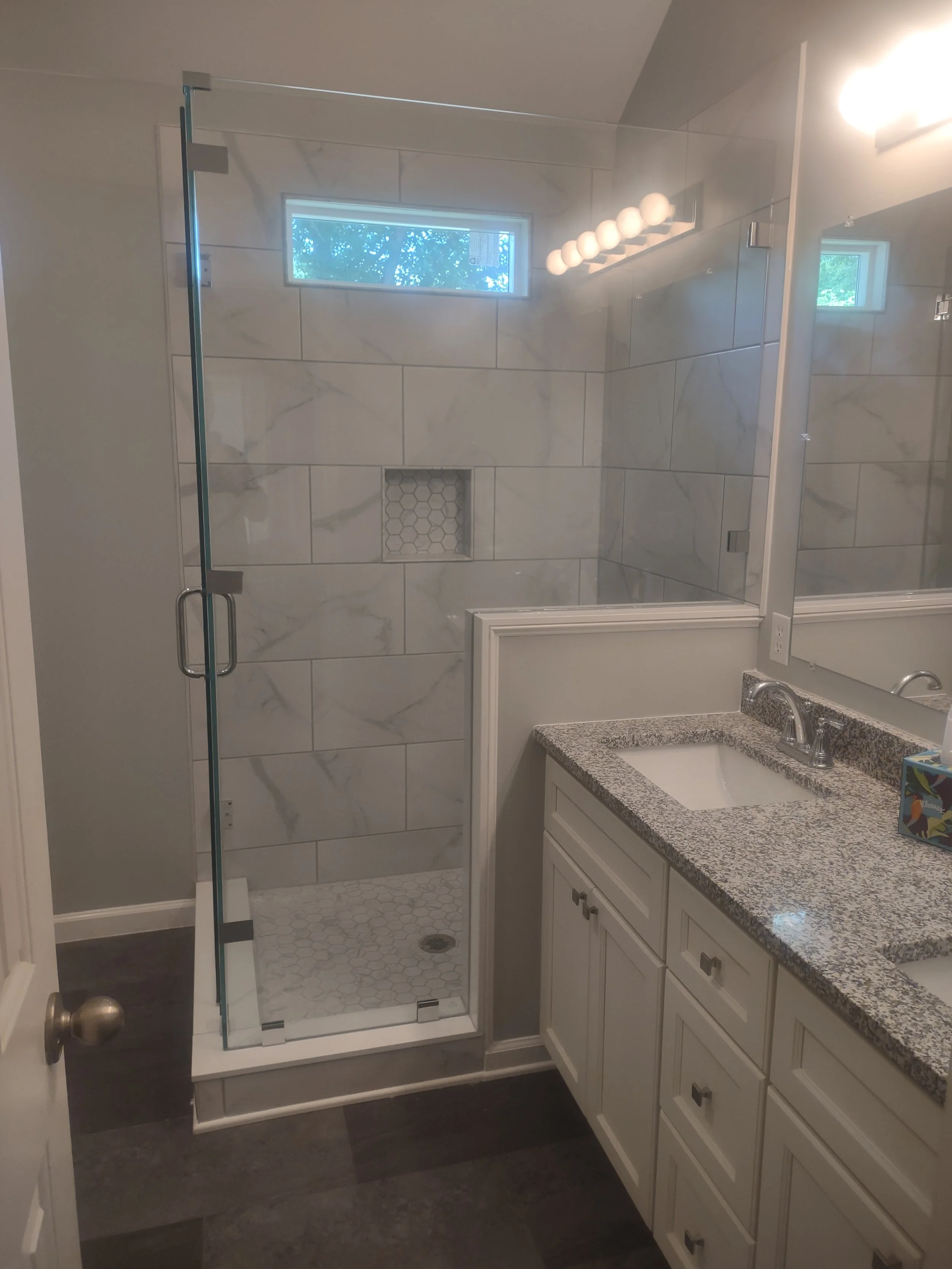 Master bath remodel emphasizing ergonomic flow and space efficiency