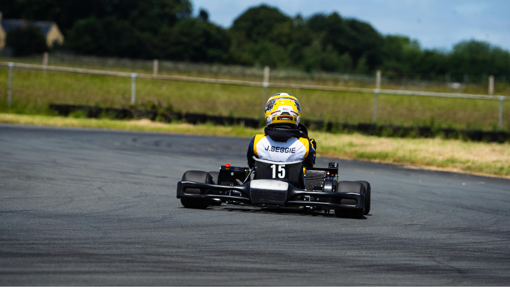 Motorsport sponsorship partner branding displayed on racing equipment