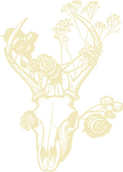 An ornate, gold-colored decorative crest or emblem with intricate details and flourishes.