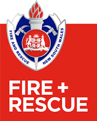 South Wales Fire and Rescue logo with a shield, flame, and the words 'Fire + Rescue' on a red background.