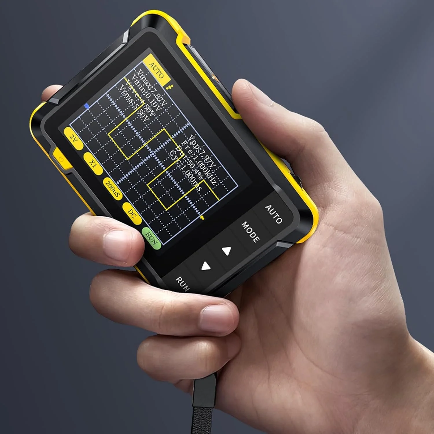 A handheld electronic device displaying a complex electrical circuit diagram on its screen, with various control buttons labeled 'AUTO,' 'MODE,' 'RUN,' 'DC,' '200MS,' and navigation arrows.