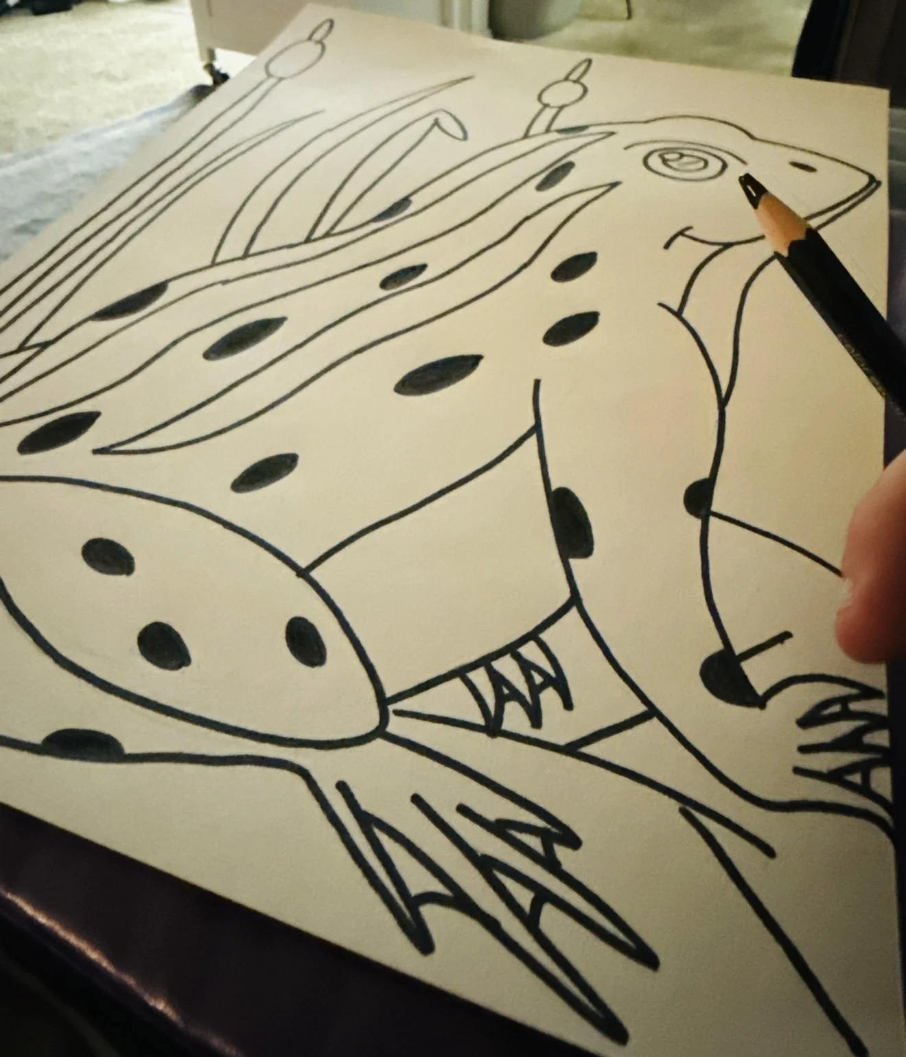 Nostalgia runs wild in Honey Bear's ART Gallery, a bullfrog reminiscent of the times going up in the country, drawn by Jesus Fidel Avila IIII.
