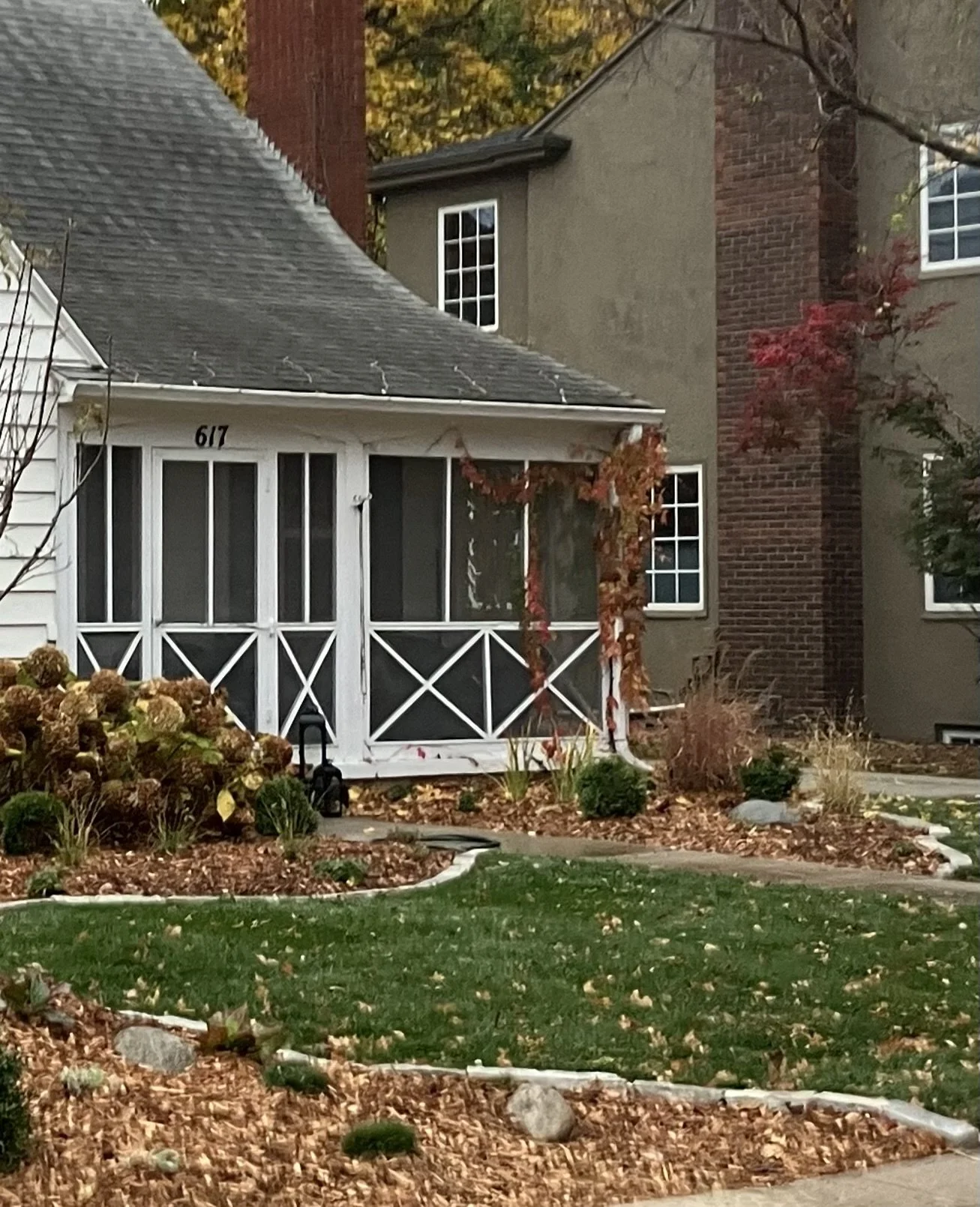 More landscaping, less yard space.  Yet this fresh turf looks great against stone edging.