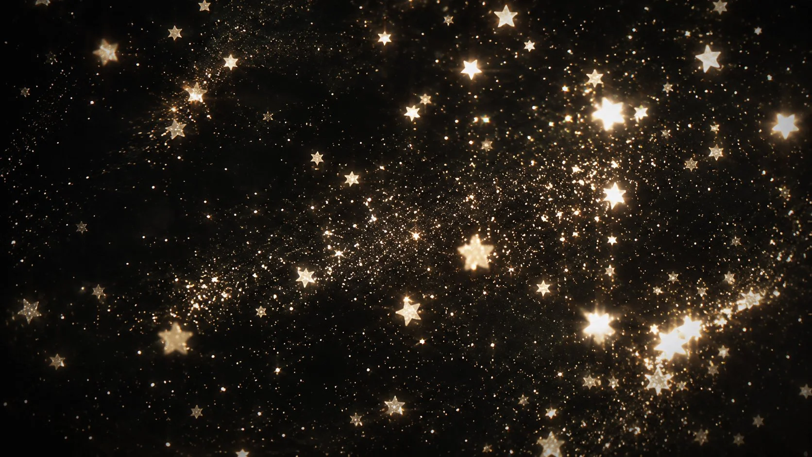 Dark background with glowing golden stars and sparkles
