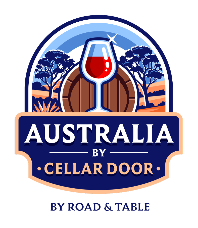 Logo for Australia by Cellar Door featuring a glass of red wine, a wine barrel, trees, and a landscape with hills, with text 'Australia by Cellar Door' and 'by road & table'.