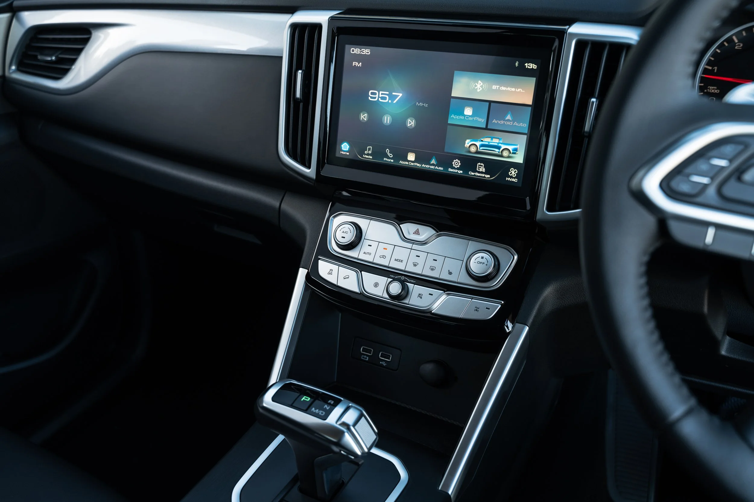 High quality image of a car interior showing high end infotatainment system