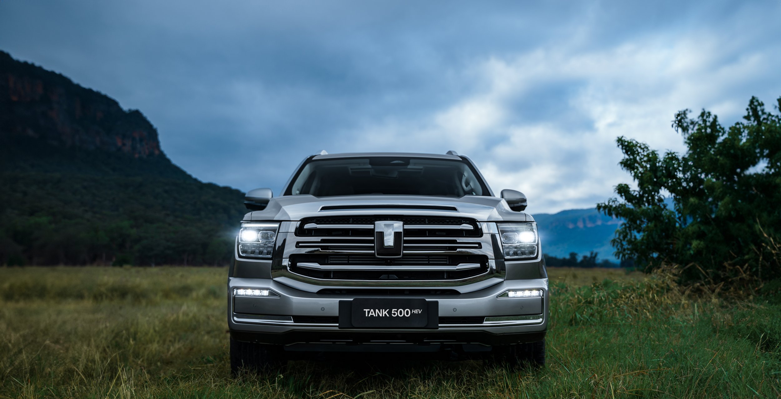 GWM Tank 500 front view amongst mountain landscape