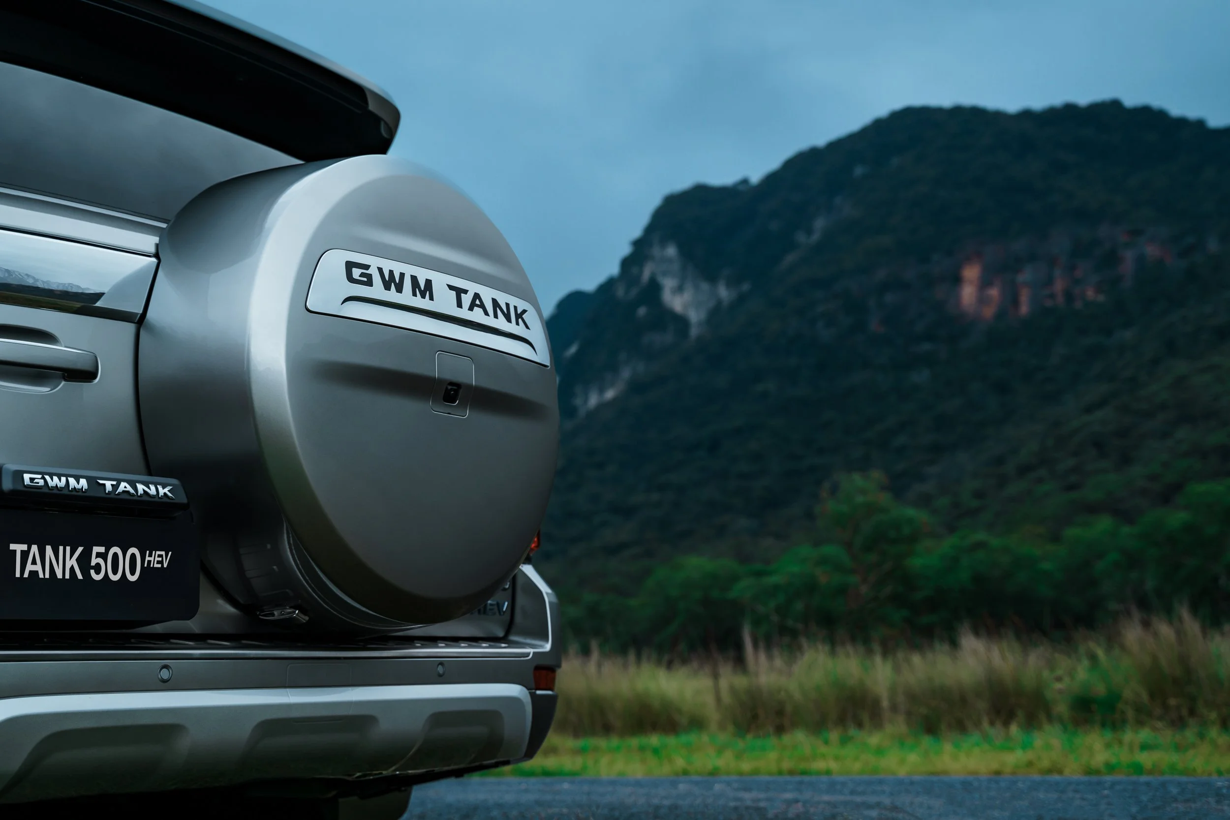 GWM Tank 500 silver, rear of car amongst aussie mountain landscape