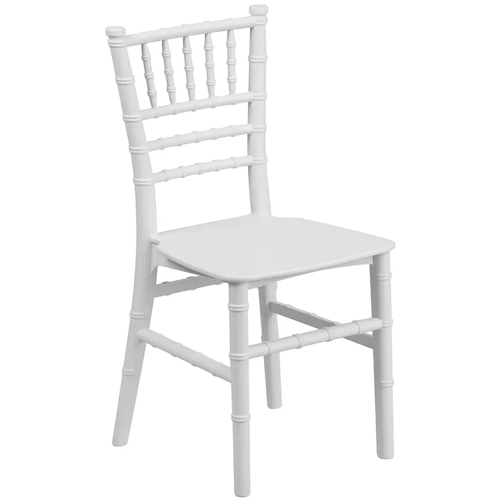 A white wooden chair with a cushioned seat and vertical spindle backrest.