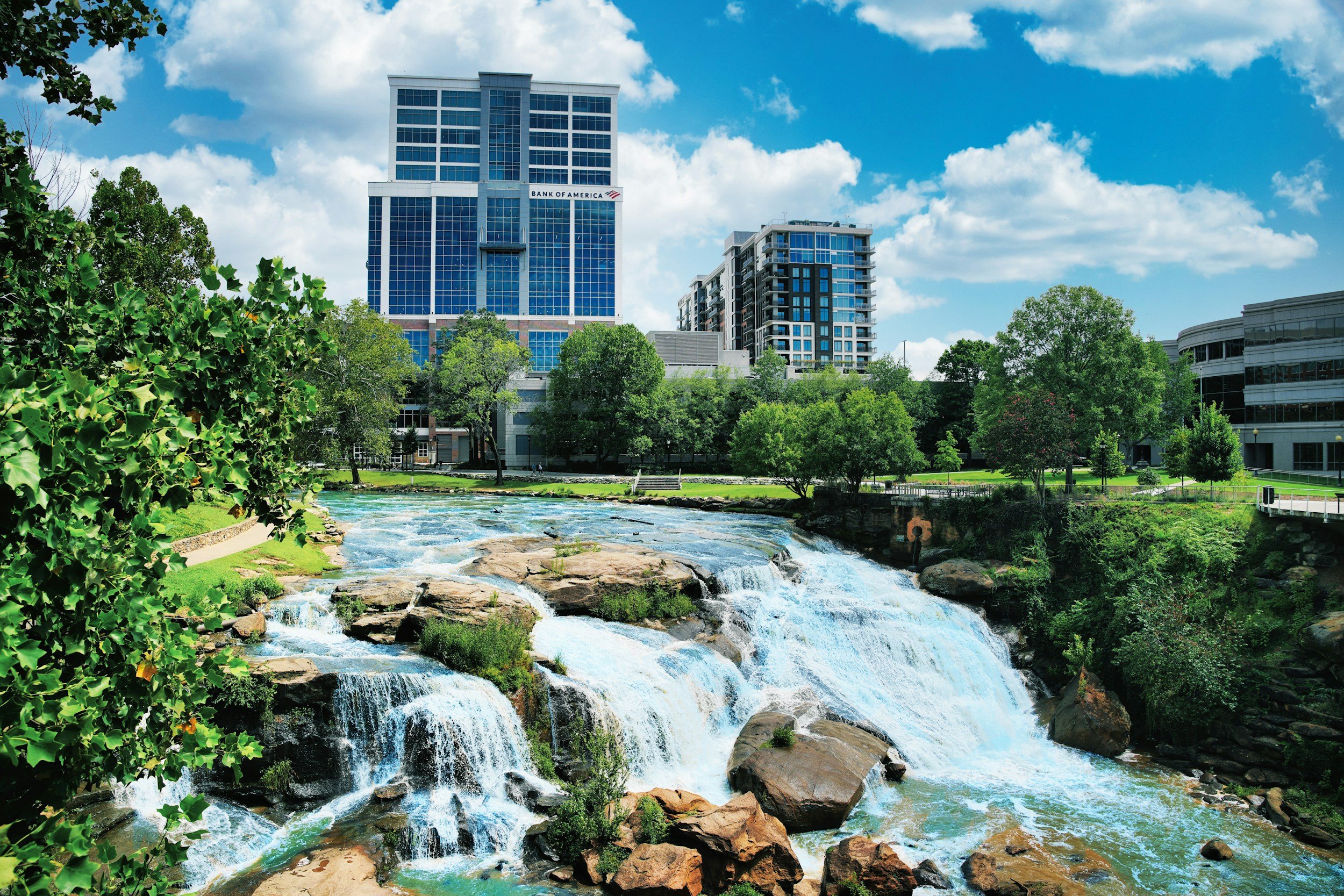 Downtown Greenville, SC is shown overlooking its famous waterfall that flows through the middle of downtown