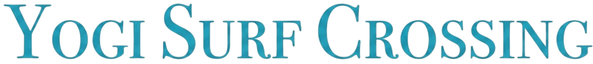 Yogisurf Crossing logo in blue text with yellow and white accents.