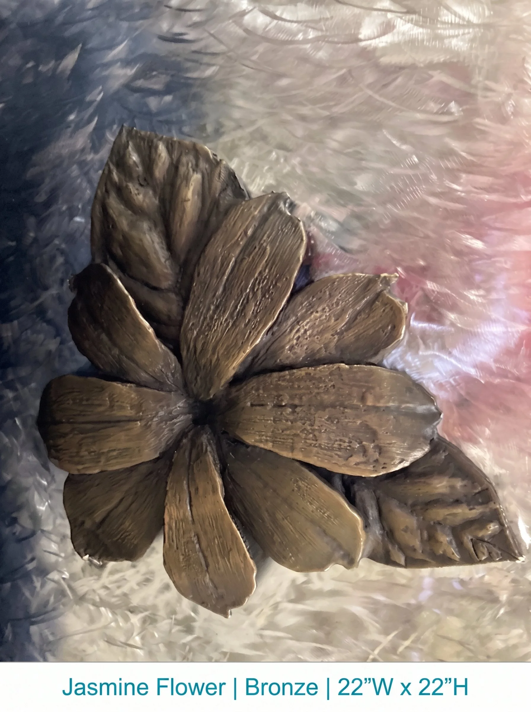 Bronze_flower_sculpture_with_text_202607071320.jpeg