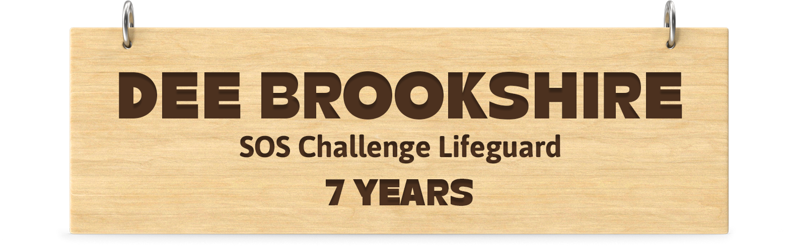 Engraved wooden board. Engraved text: Dee Brookshire SOS Challenge Lifeguard 7 Years
