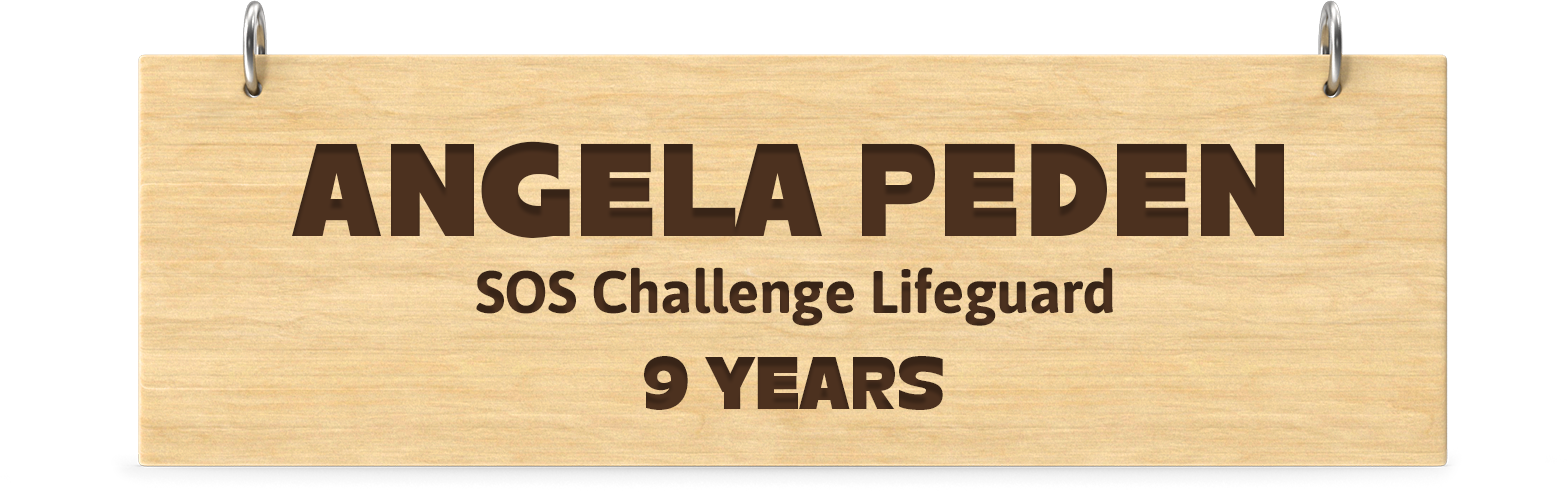 Engraved wooden board. Engraved text: Angela Peden SOS Challenge Lifeguard 9 Years