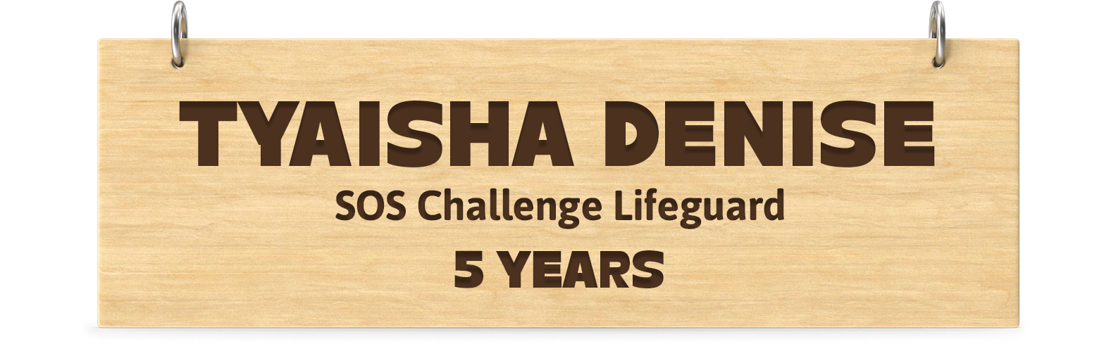 Engraved wooden board. Engraved text: Tyaisha Denise SOS Challenge Lifeguard 5 Years