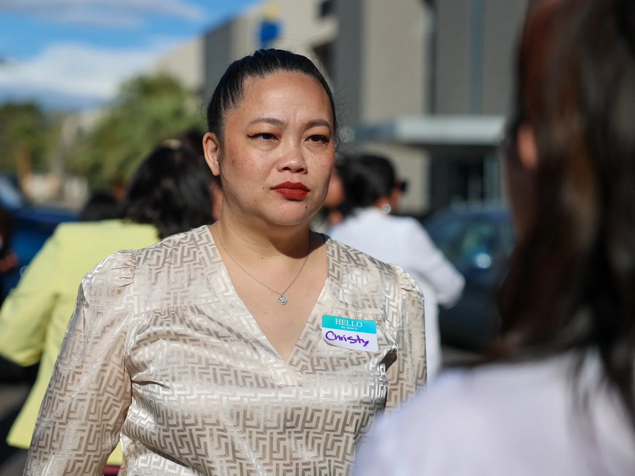 Christy listening to another individual speak