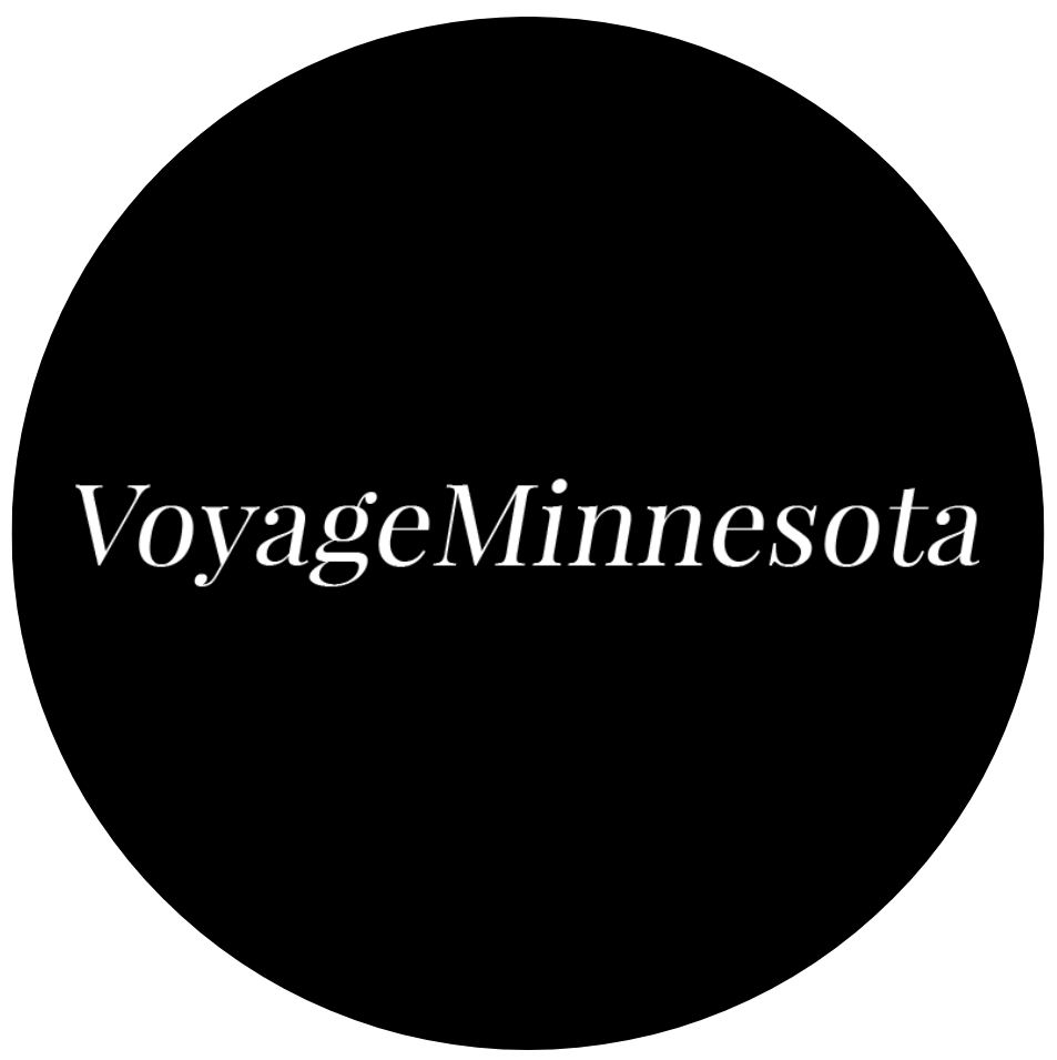 Black background with white text reading "Voyage Minnesota"