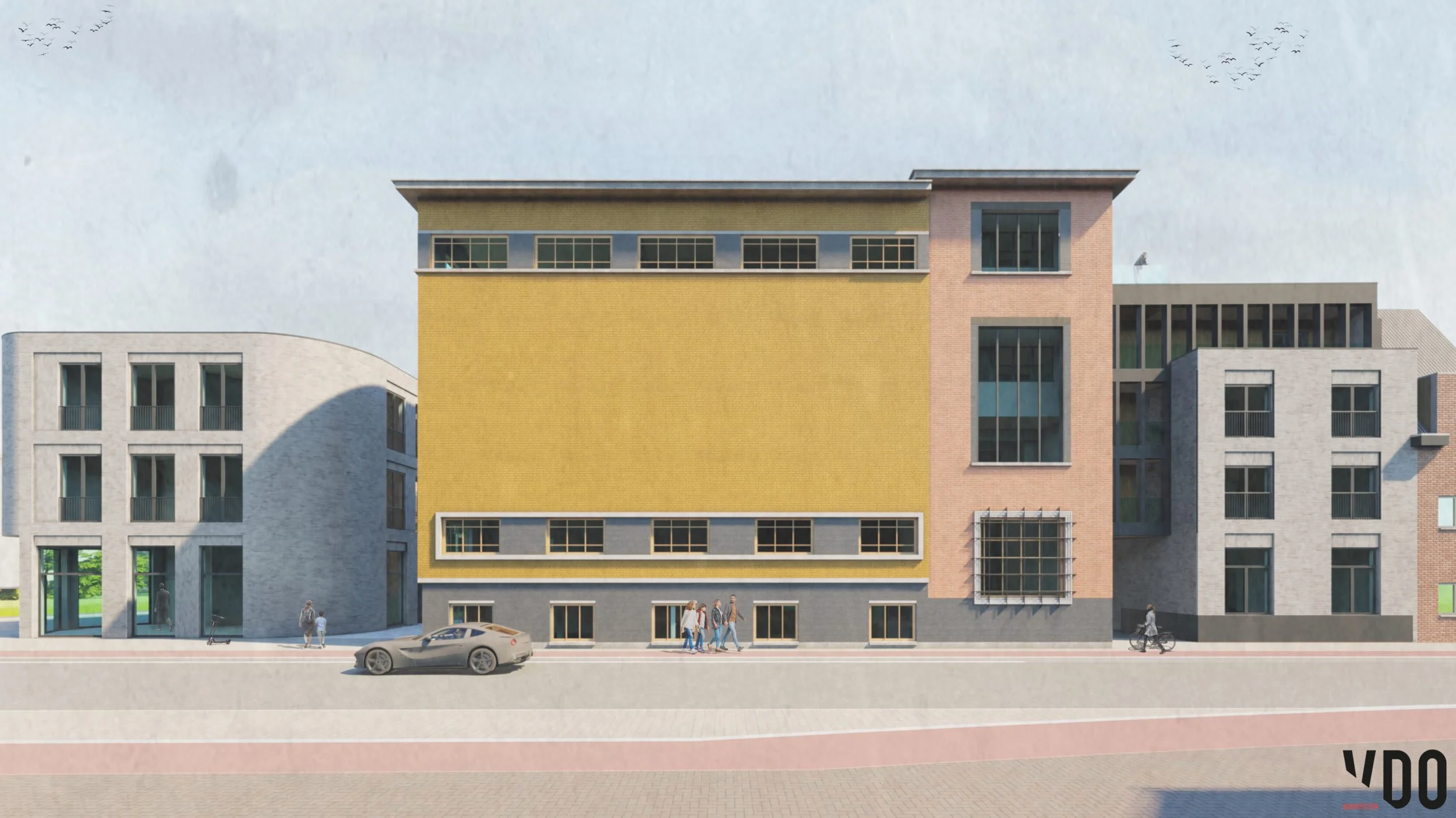 Colorful modern building with yellow, pink, and gray sections, large windows, people walking and riding bikes on the street, a car parked, and a person walking in the background.