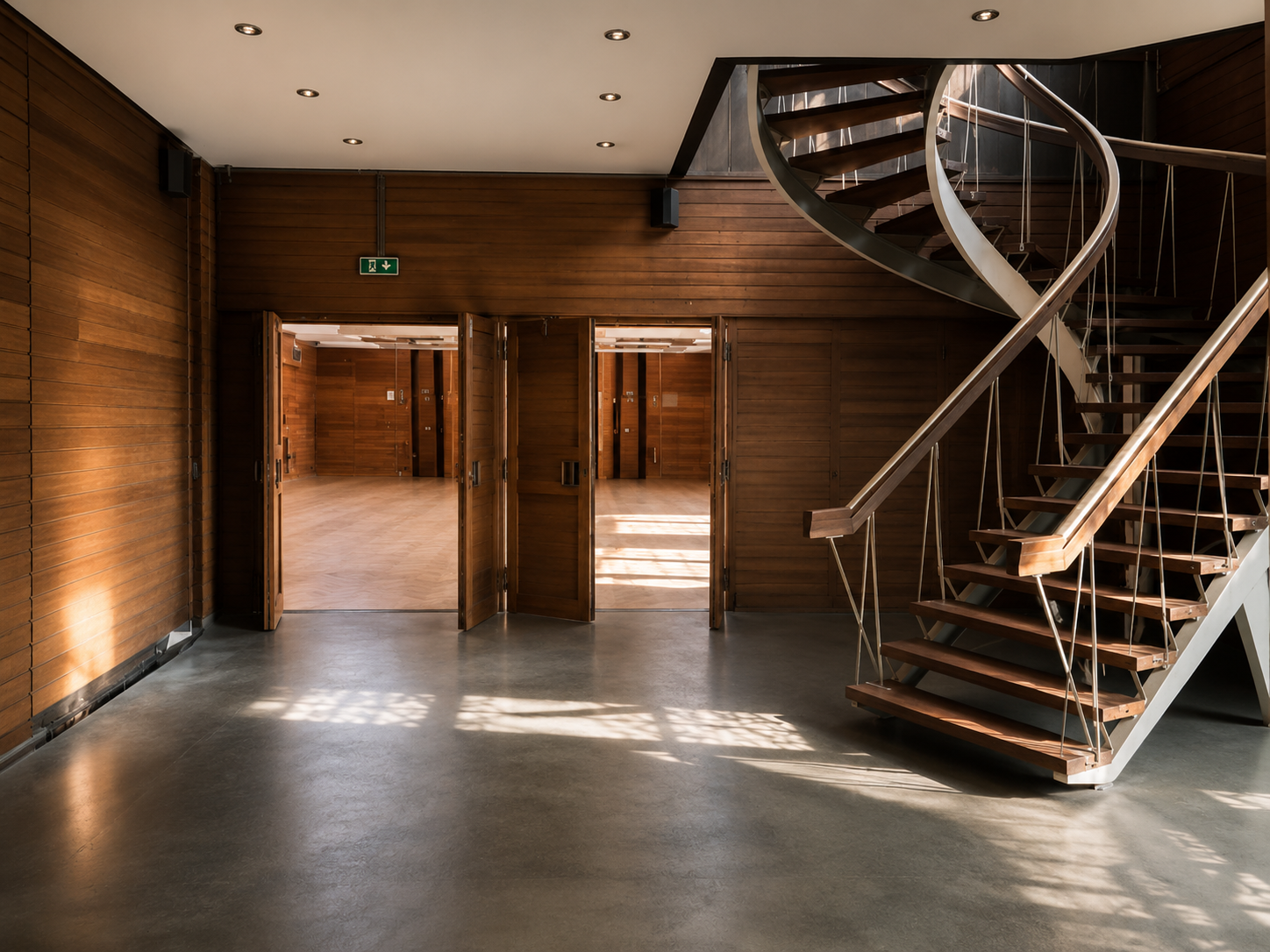 The striking interior of the Oudaan, designed by architect Renaat Braem, featuring remarkable architecture and abundant natural light.